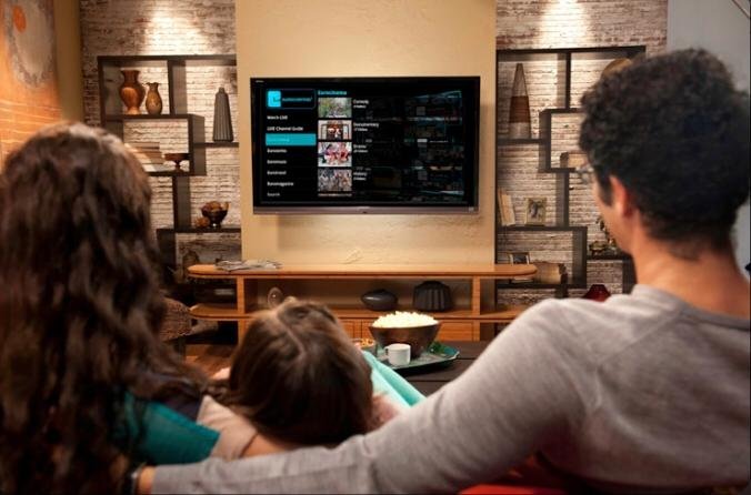 A family gathers at home to enjoy their favorite movie via IPTV