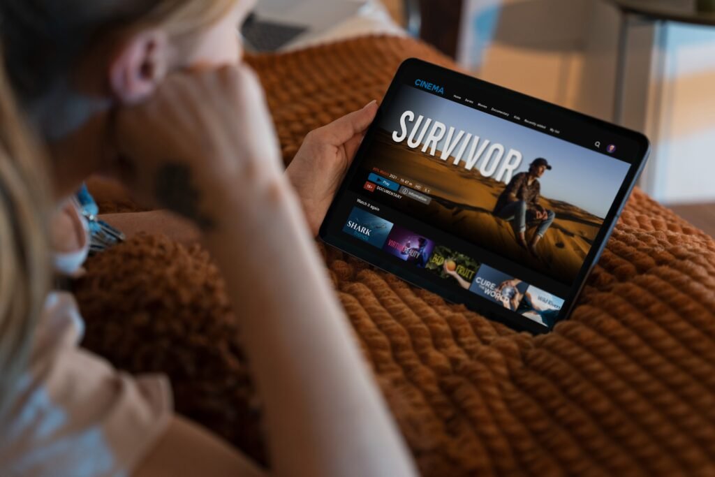 woman watching movie streaming service home